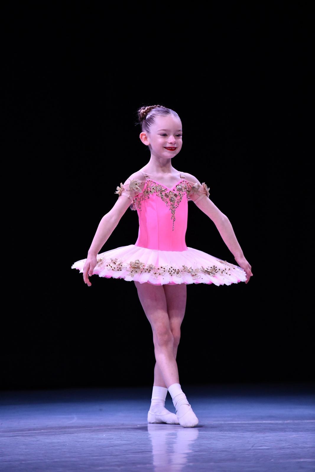 Moondance dancer in a pink tutu on stage